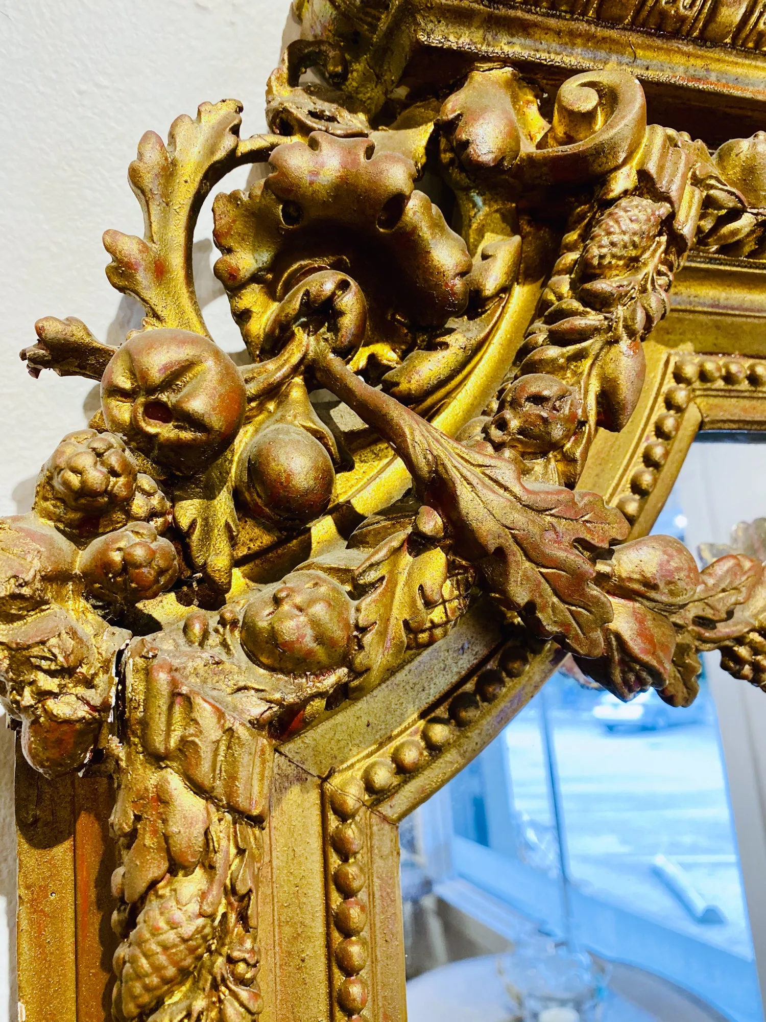 Antique French Gilt Mirror with Swag Detail and Ornate Cartouche