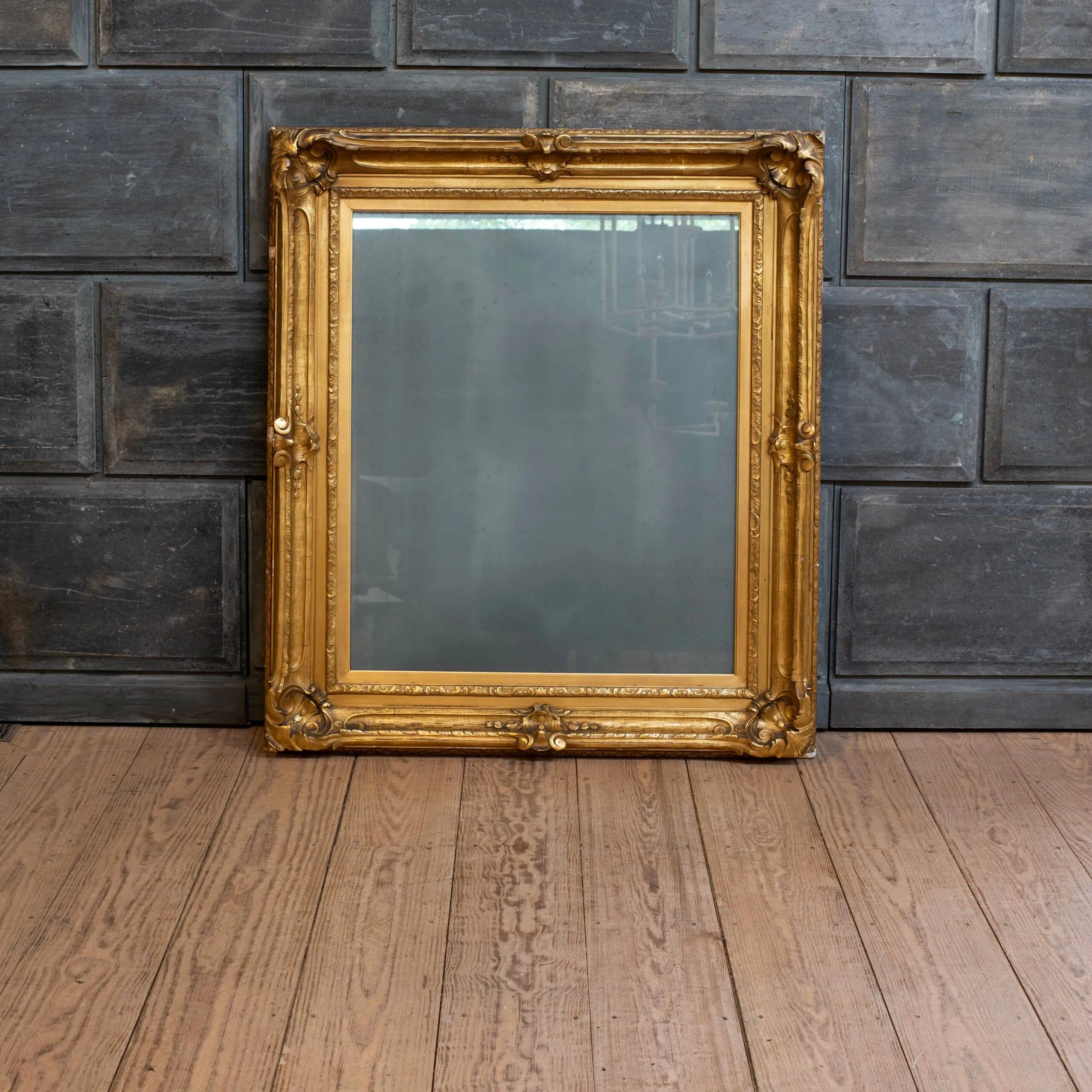 Large “Artist’s Framing Company” Gilt Mirror with Heavily Distressed Glass